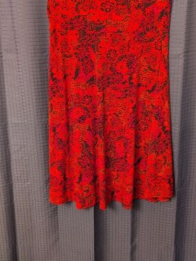 NWOT LuLaRoe Red, Orange, and Black Patterned A-Line Skirt  L